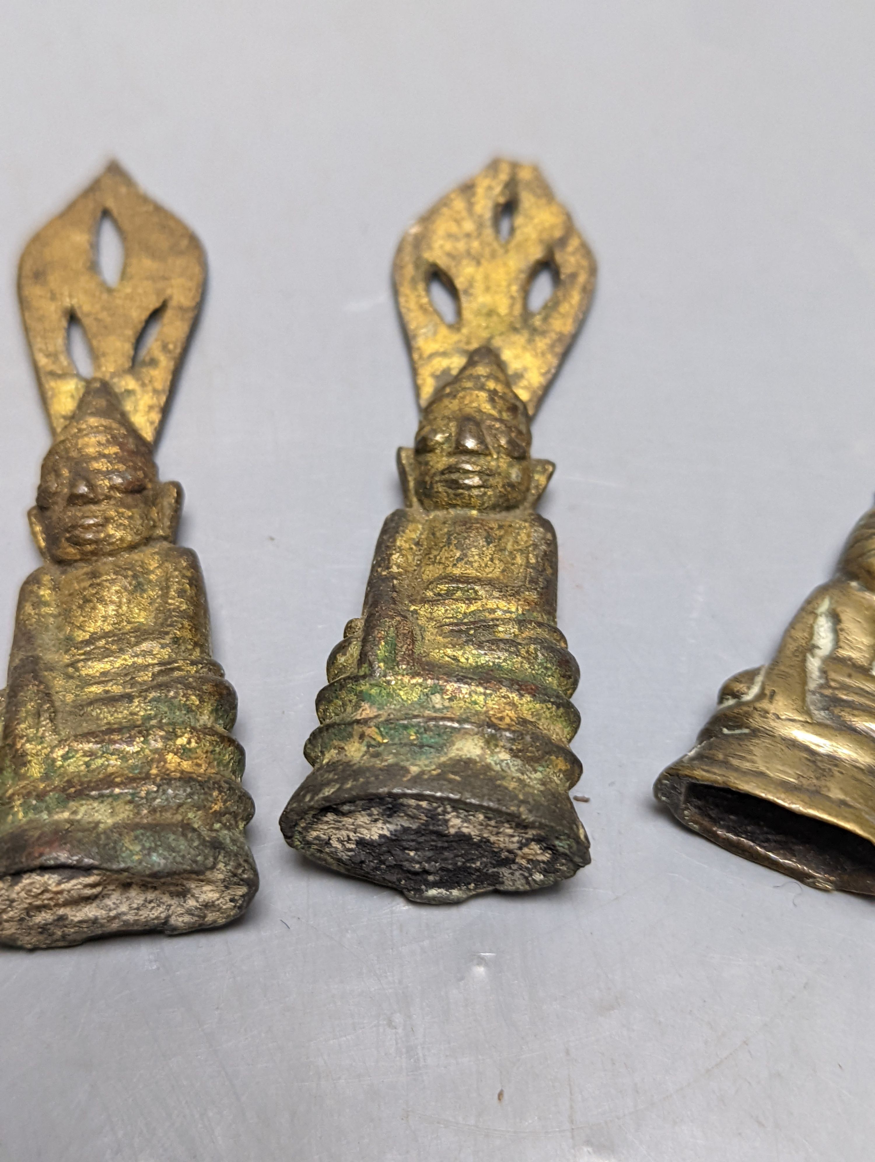 Four brass Buddha